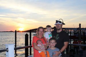 kristen webb and family at sunset on destin harbor