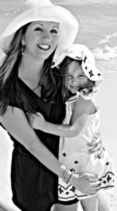 carrie anne and daughter on the beach