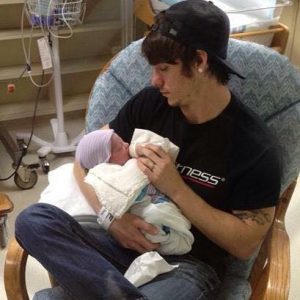 dad feeds daughter for first time